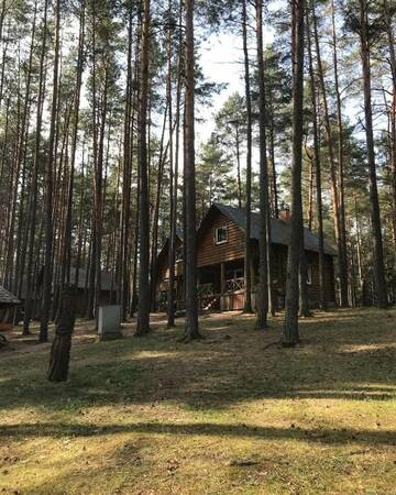 Фото номера Семейный номер с видом на озеро Загородные дома Šaulys г. Varnėnai 13